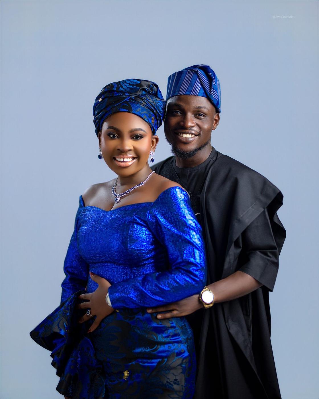 Kathryn and Samuel in matching royal blue aso oke
